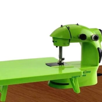Sewing machine with oval shaped table