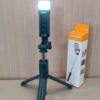 Selfie stick phone holder with light
